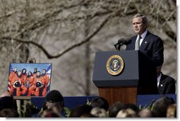 Speaking to the memory of the seven astronauts who lost their lives in Space Shuttle Columbia disaster, President George W. Bush addresses the nation's loss during a memorial service at the NASA Lyndon B. Johnson Space Center Tuesday, Feb. 4, 2003. "This cause of exploration and discovery is not an option we choose; it is a desire written in the human heart. We are that part of creation which seeks to understand all creation," said the President. "We find the best among us, send them forth into unmapped darkness, and pray they will return. They go in peace for all mankind, and all mankind is in their debt."  White House photo by Paul Morse